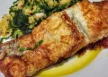 Bacalhau Confitado em azeite com Migas de Broa de Milho
