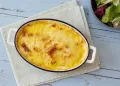 Pescada Gratinada com cenoura e queijo