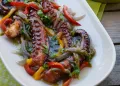 Polvo Confitado com Pimentos
